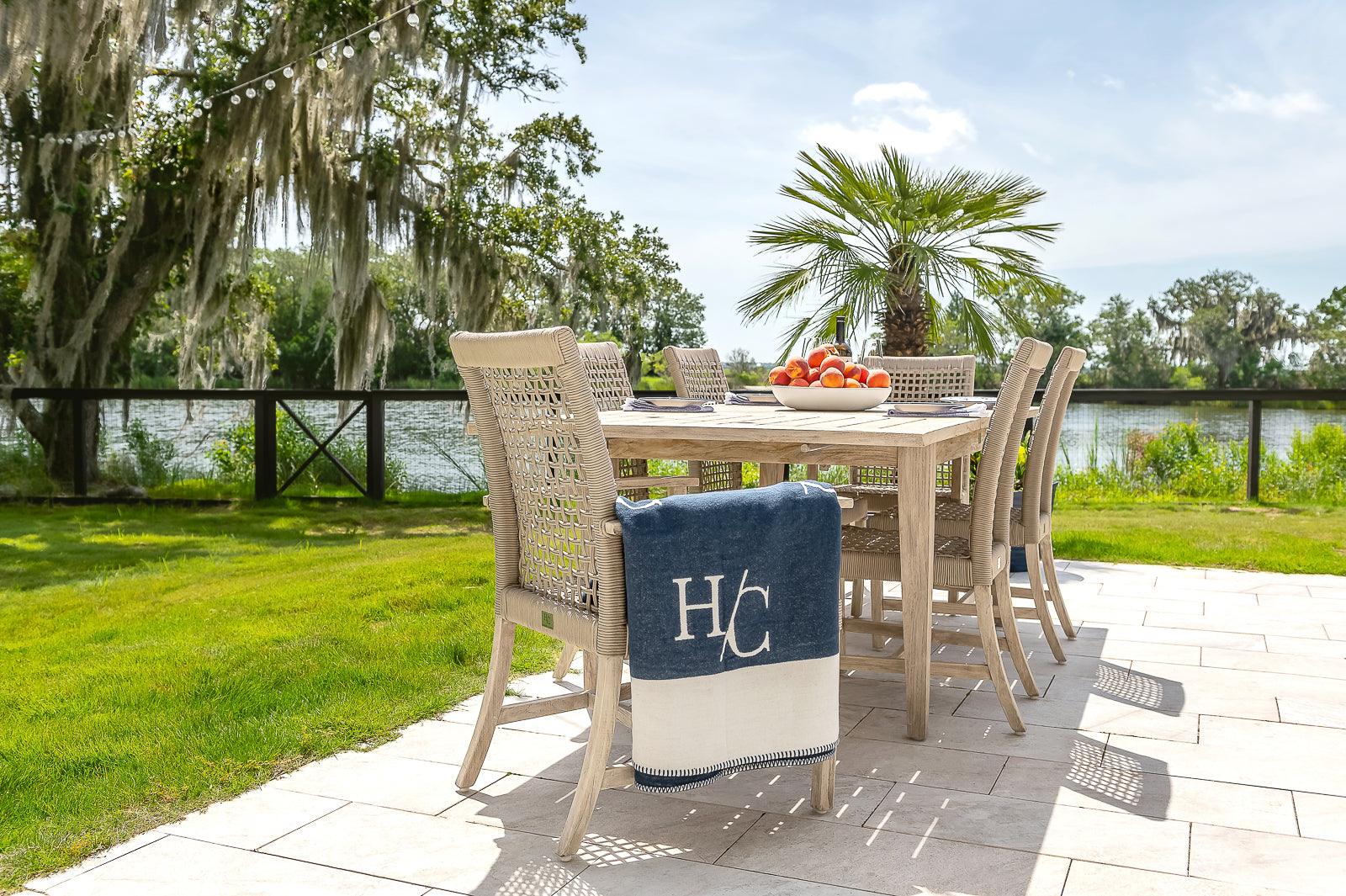 gray teak and rope chairs